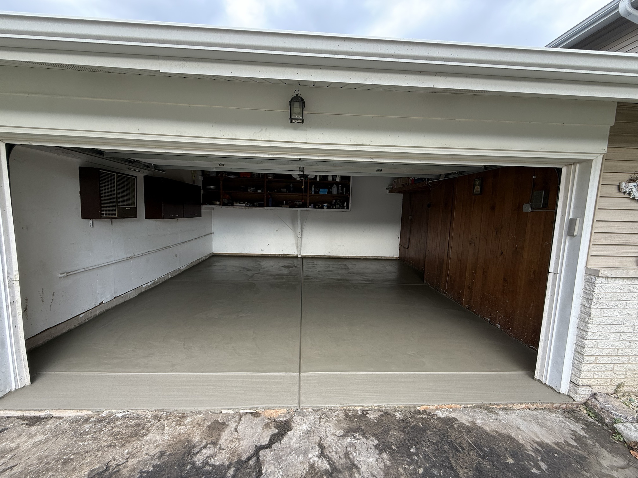 Garage concrete floor project by PFS Concrete & Asphalt